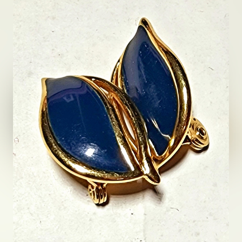 Monet Vintage 1990s blue enameled and gold abstract flame clip on earrings